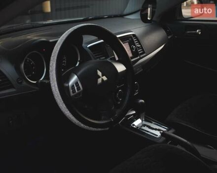 Білий Міцубісі Lancer, об'ємом двигуна 1.6 л та пробігом 247 тис. км за 8200 $, фото 12 на Automoto.ua