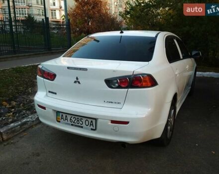 Белый Мицубиси Лансер, объемом двигателя 1.59 л и пробегом 110 тыс. км за 7300 $, фото 4 на Automoto.ua