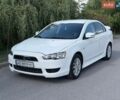 Білий Міцубісі Lancer, об'ємом двигуна 2 л та пробігом 135 тис. км за 8400 $, фото 1 на Automoto.ua