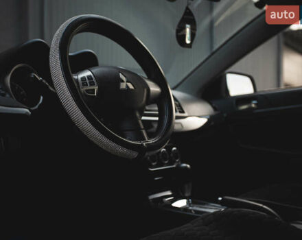 Білий Міцубісі Lancer, об'ємом двигуна 1.6 л та пробігом 248 тис. км за 8500 $, фото 27 на Automoto.ua