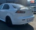 Белый Мицубиси Лансер, объемом двигателя 2.4 л и пробегом 202 тыс. км за 8290 $, фото 5 на Automoto.ua