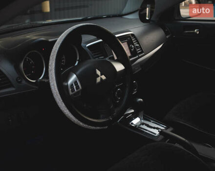 Білий Міцубісі Lancer, об'ємом двигуна 1.6 л та пробігом 248 тис. км за 8500 $, фото 28 на Automoto.ua