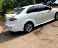 Білий Міцубісі Lancer, об'ємом двигуна 2 л та пробігом 150 тис. км за 9800 $, фото 1 на Automoto.ua