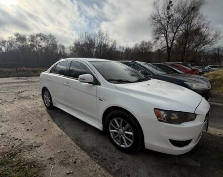 Білий Міцубісі Lancer, об'ємом двигуна 2 л та пробігом 146 тис. км за 7700 $, фото 1 на Automoto.ua