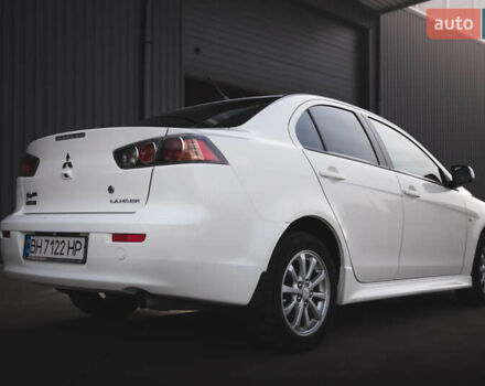 Білий Міцубісі Lancer, об'ємом двигуна 1.6 л та пробігом 248 тис. км за 8500 $, фото 2 на Automoto.ua