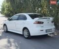 Білий Міцубісі Lancer, об'ємом двигуна 2 л та пробігом 135 тис. км за 8400 $, фото 14 на Automoto.ua