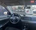Белый Мицубиси Лансер, объемом двигателя 2.4 л и пробегом 202 тыс. км за 8290 $, фото 28 на Automoto.ua