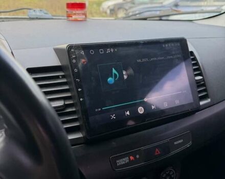 Білий Міцубісі Lancer, об'ємом двигуна 2 л та пробігом 146 тис. км за 7700 $, фото 5 на Automoto.ua