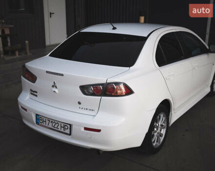 Білий Міцубісі Lancer, об'ємом двигуна 1.6 л та пробігом 248 тис. км за 8500 $, фото 16 на Automoto.ua