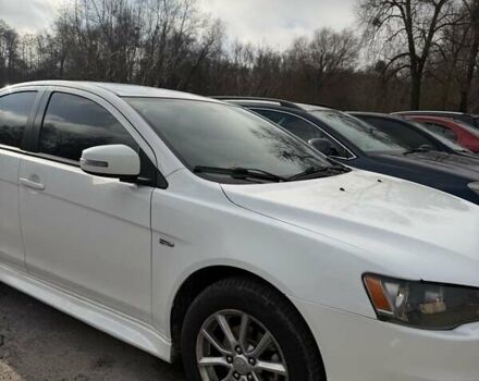Білий Міцубісі Lancer, об'ємом двигуна 2 л та пробігом 146 тис. км за 7700 $, фото 2 на Automoto.ua