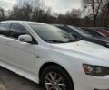 Білий Міцубісі Lancer, об'ємом двигуна 2 л та пробігом 146 тис. км за 7700 $, фото 2 на Automoto.ua