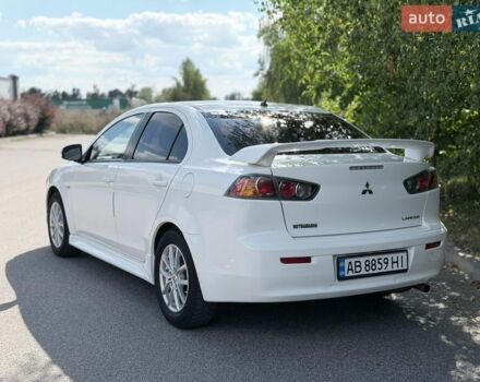 Білий Міцубісі Lancer, об'ємом двигуна 2 л та пробігом 135 тис. км за 8400 $, фото 13 на Automoto.ua