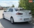 Білий Міцубісі Lancer, об'ємом двигуна 2 л та пробігом 135 тис. км за 8400 $, фото 13 на Automoto.ua