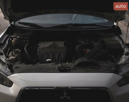 Білий Міцубісі Lancer, об'ємом двигуна 1.6 л та пробігом 248 тис. км за 8500 $, фото 29 на Automoto.ua
