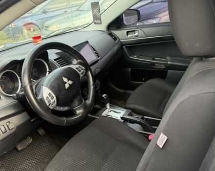 Білий Міцубісі Lancer, об'ємом двигуна 2 л та пробігом 146 тис. км за 7700 $, фото 3 на Automoto.ua