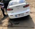 Білий Міцубісі Lancer, об'ємом двигуна 2 л та пробігом 150 тис. км за 9800 $, фото 2 на Automoto.ua