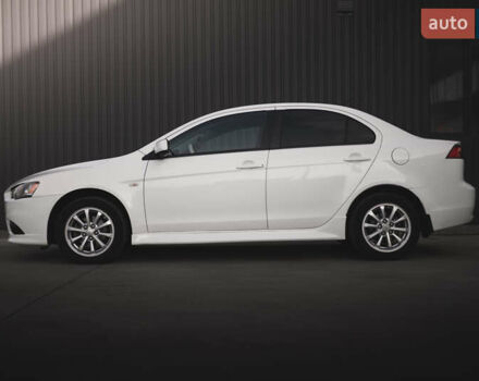 Білий Міцубісі Lancer, об'ємом двигуна 1.6 л та пробігом 248 тис. км за 8500 $, фото 4 на Automoto.ua
