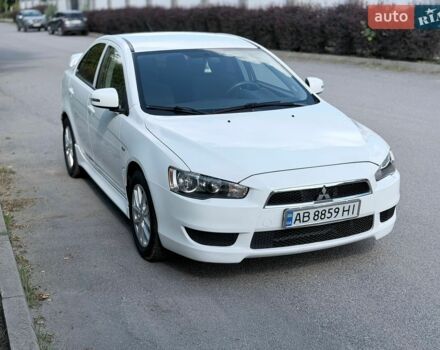 Білий Міцубісі Lancer, об'ємом двигуна 2 л та пробігом 135 тис. км за 8400 $, фото 9 на Automoto.ua