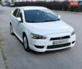 Білий Міцубісі Lancer, об'ємом двигуна 2 л та пробігом 135 тис. км за 8400 $, фото 9 на Automoto.ua