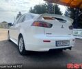 Белый Мицубиси Лансер, объемом двигателя 2 л и пробегом 132 тыс. км за 9200 $, фото 1 на Automoto.ua