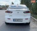 Білий Міцубісі Lancer, об'ємом двигуна 2 л та пробігом 135 тис. км за 8400 $, фото 7 на Automoto.ua