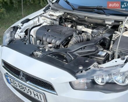 Білий Міцубісі Lancer, об'ємом двигуна 2 л та пробігом 135 тис. км за 8400 $, фото 6 на Automoto.ua