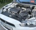 Білий Міцубісі Lancer, об'ємом двигуна 2 л та пробігом 135 тис. км за 8400 $, фото 6 на Automoto.ua