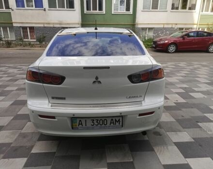 Білий Міцубісі Lancer, об'ємом двигуна 1.6 л та пробігом 114 тис. км за 9000 $, фото 8 на Automoto.ua