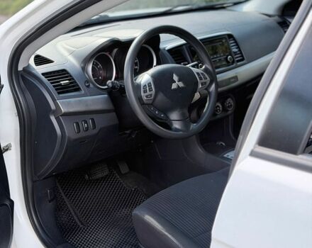 Білий Міцубісі Lancer, об'ємом двигуна 2 л та пробігом 135 тис. км за 8400 $, фото 12 на Automoto.ua