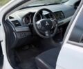 Білий Міцубісі Lancer, об'ємом двигуна 2 л та пробігом 135 тис. км за 8400 $, фото 12 на Automoto.ua
