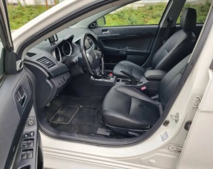 Белый Мицубиси Лансер, объемом двигателя 1.8 л и пробегом 82 тыс. км за 8800 $, фото 6 на Automoto.ua