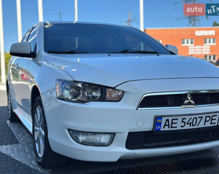 Білий Міцубісі Lancer, об'ємом двигуна 2 л та пробігом 165 тис. км за 7899 $, фото 1 на Automoto.ua