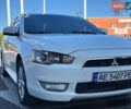 Білий Міцубісі Lancer, об'ємом двигуна 2 л та пробігом 165 тис. км за 7899 $, фото 1 на Automoto.ua