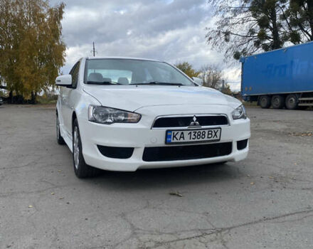 Мицубиси Лансер 2015 в Остоге на Automoto.ua Белый Мицубиси Лансер, объемом двигателя 2 л и пробегом 131 тыс. км за 9000 $, фото 16 на Automoto.ua