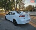 Білий Міцубісі Lancer, об'ємом двигуна 1.6 л та пробігом 192 тис. км за 8920 $, фото 1 на Automoto.ua