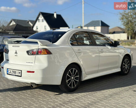Білий Міцубісі Lancer, об'ємом двигуна 2.36 л та пробігом 175 тис. км за 9000 $, фото 5 на Automoto.ua