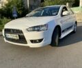 Білий Міцубісі Lancer, об'ємом двигуна 2 л та пробігом 132 тис. км за 8200 $, фото 2 на Automoto.ua