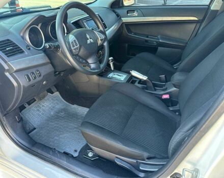 Белый Мицубиси Лансер, объемом двигателя 2 л и пробегом 113 тыс. км за 8500 $, фото 8 на Automoto.ua