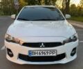 Белый Мицубиси Лансер, объемом двигателя 2 л и пробегом 65 тыс. км за 8509 $, фото 1 на Automoto.ua