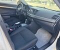 Білий Міцубісі Lancer, об'ємом двигуна 2 л та пробігом 165 тис. км за 8999 $, фото 14 на Automoto.ua