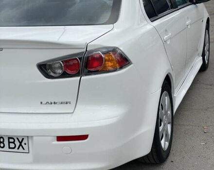 Мицубиси Лансер 2015 в Остоге на Automoto.ua Белый Мицубиси Лансер, объемом двигателя 2 л и пробегом 131 тыс. км за 9000 $, фото 14 на Automoto.ua