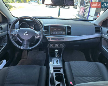 Білий Міцубісі Lancer, об'ємом двигуна 2 л та пробігом 165 тис. км за 7899 $, фото 7 на Automoto.ua