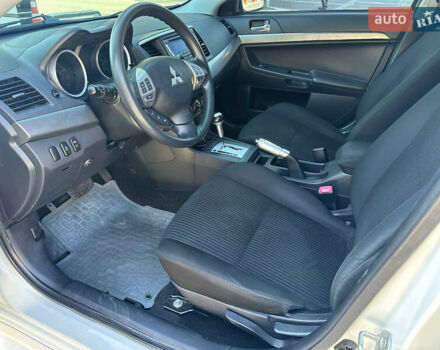 Білий Міцубісі Lancer, об'ємом двигуна 2 л та пробігом 165 тис. км за 7899 $, фото 8 на Automoto.ua