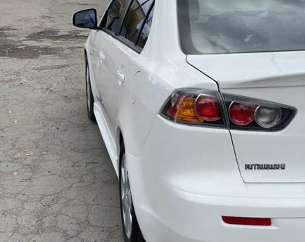 Мицубиси Лансер 2015 в Остоге на Automoto.ua Белый Мицубиси Лансер, объемом двигателя 2 л и пробегом 131 тыс. км за 9000 $, фото 13 на Automoto.ua