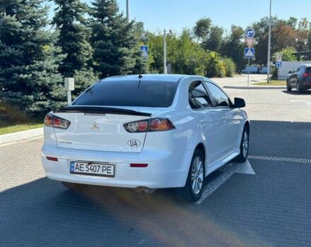Белый Мицубиси Лансер, объемом двигателя 2 л и пробегом 113 тыс. км за 8500 $, фото 3 на Automoto.ua