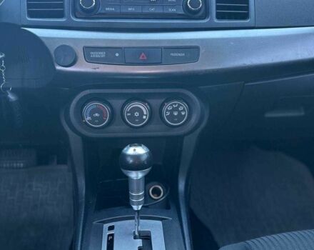 Белый Мицубиси Лансер, объемом двигателя 2 л и пробегом 113 тыс. км за 8500 $, фото 7 на Automoto.ua