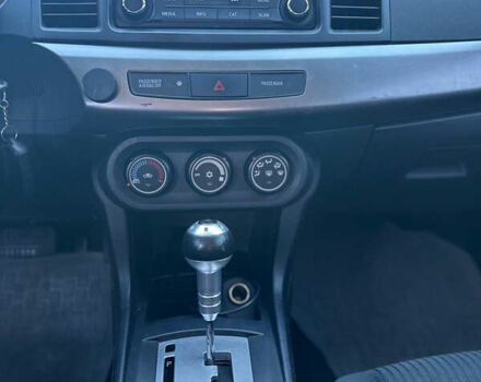 Білий Міцубісі Lancer, об'ємом двигуна 2 л та пробігом 165 тис. км за 7899 $, фото 9 на Automoto.ua
