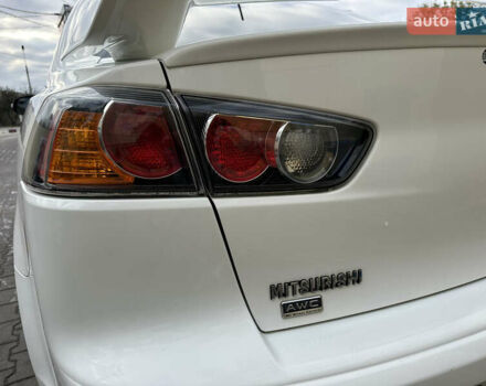 Білий Міцубісі Lancer, об'ємом двигуна 2.36 л та пробігом 175 тис. км за 9000 $, фото 9 на Automoto.ua