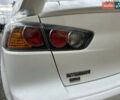 Білий Міцубісі Lancer, об'ємом двигуна 2.36 л та пробігом 175 тис. км за 9000 $, фото 9 на Automoto.ua