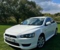 Білий Міцубісі Lancer, об'ємом двигуна 2 л та пробігом 230 тис. км за 8700 $, фото 1 на Automoto.ua